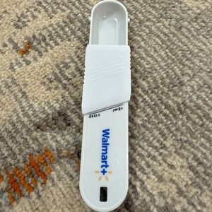 Walmart Plus Advertising Ad plastic white measuring spoon teaspoon tablespoon